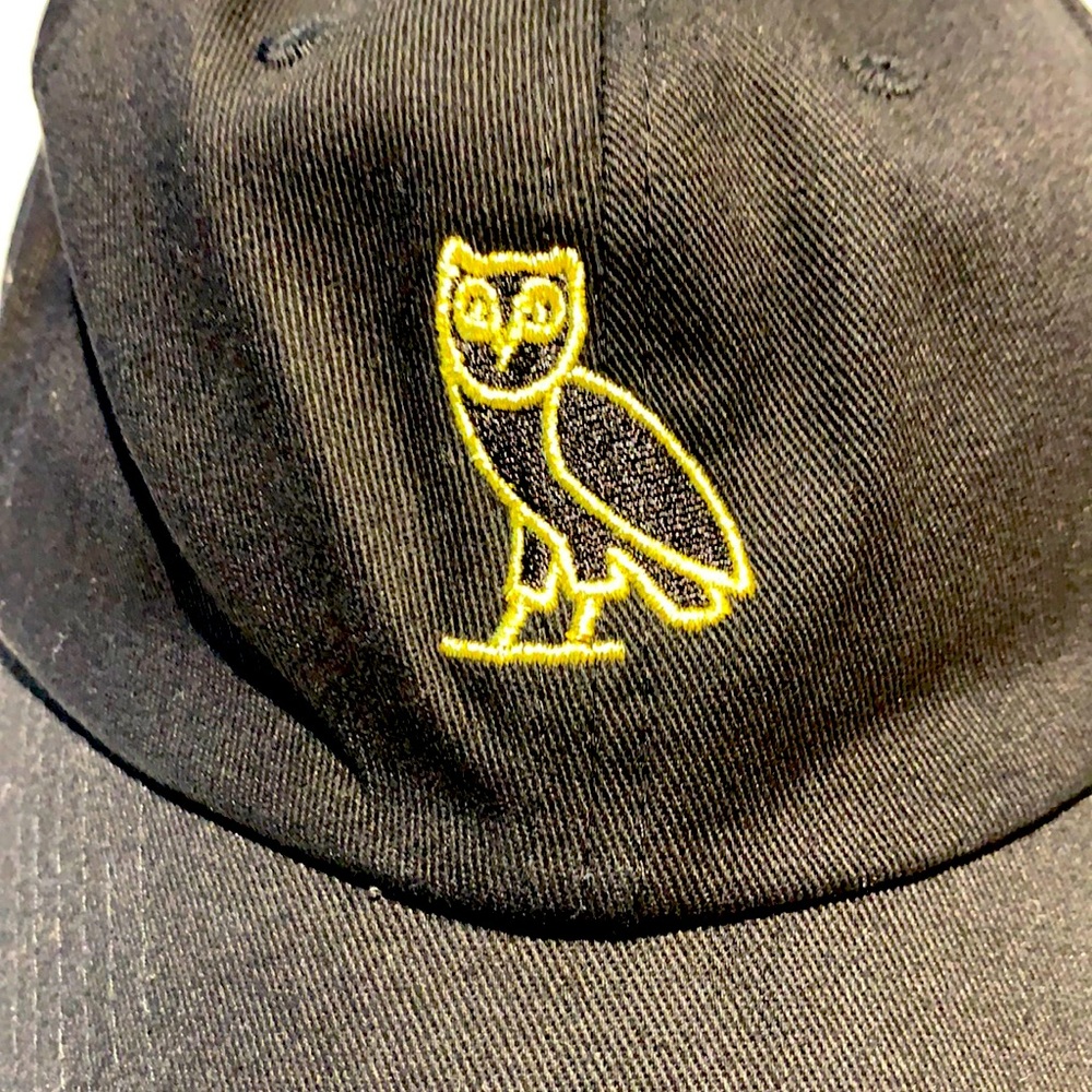 Baseball cap.  Adjustable back.  Black and gold. Barely worn